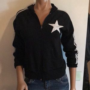 Black jacket with hood, stripes on sleeves, star on left area.